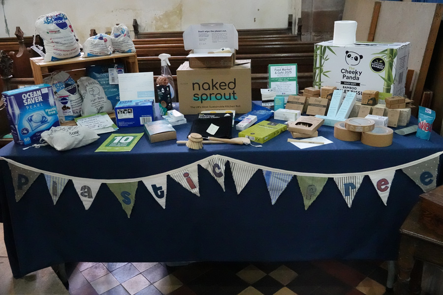 A table in Hanley Castle church full off different sustainable household products