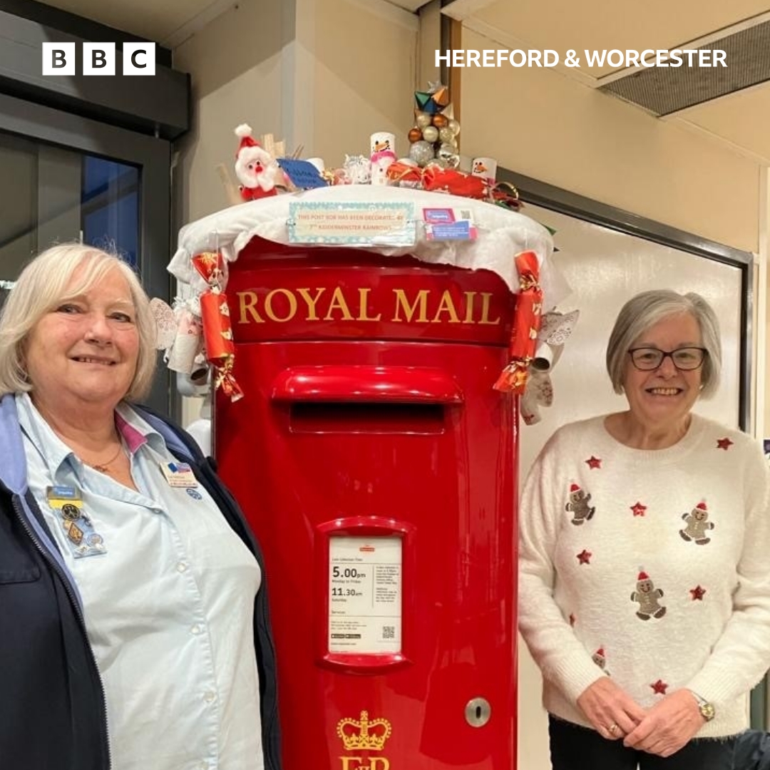 Sue Smithson & Heather Prangley with a decorated postbox between them
