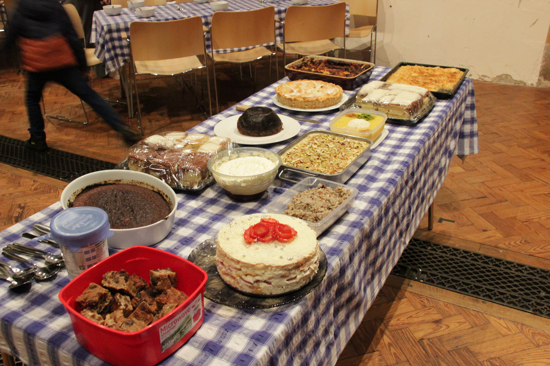 Table full of different types of puddings