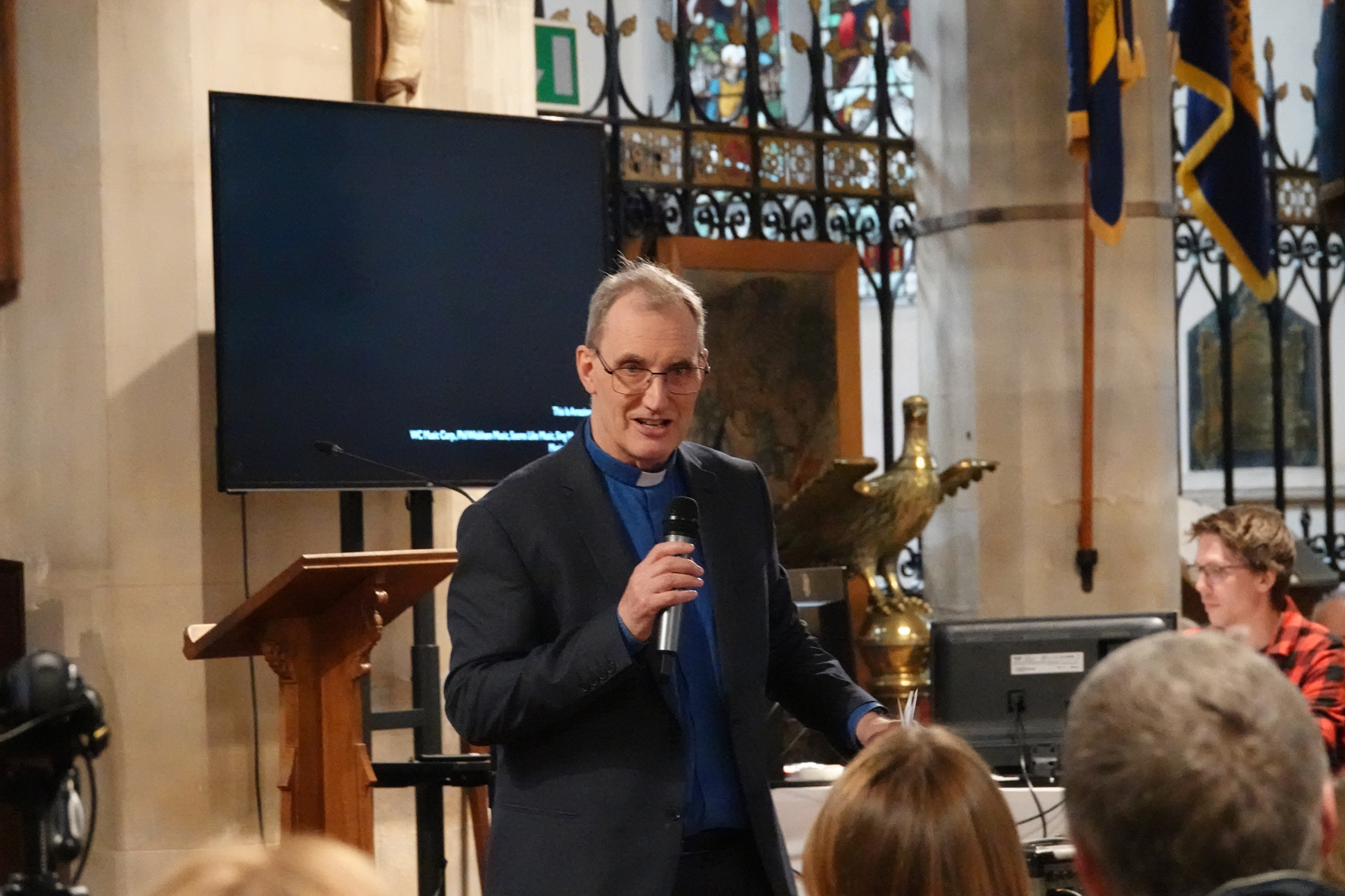 Paul Lawlor speaking at the front of St Stephen's church