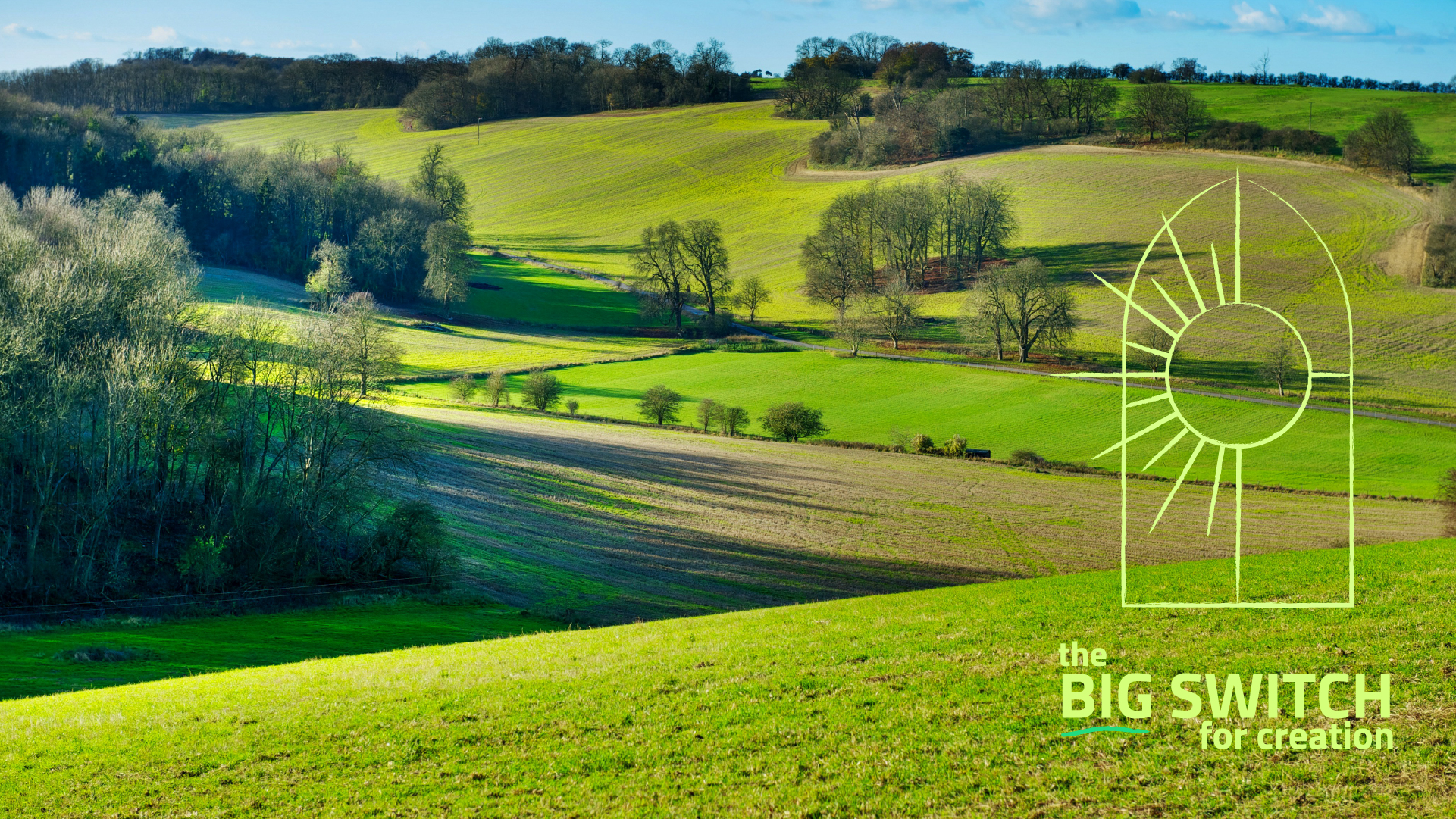 The big switch logo in front of some rolling green fields