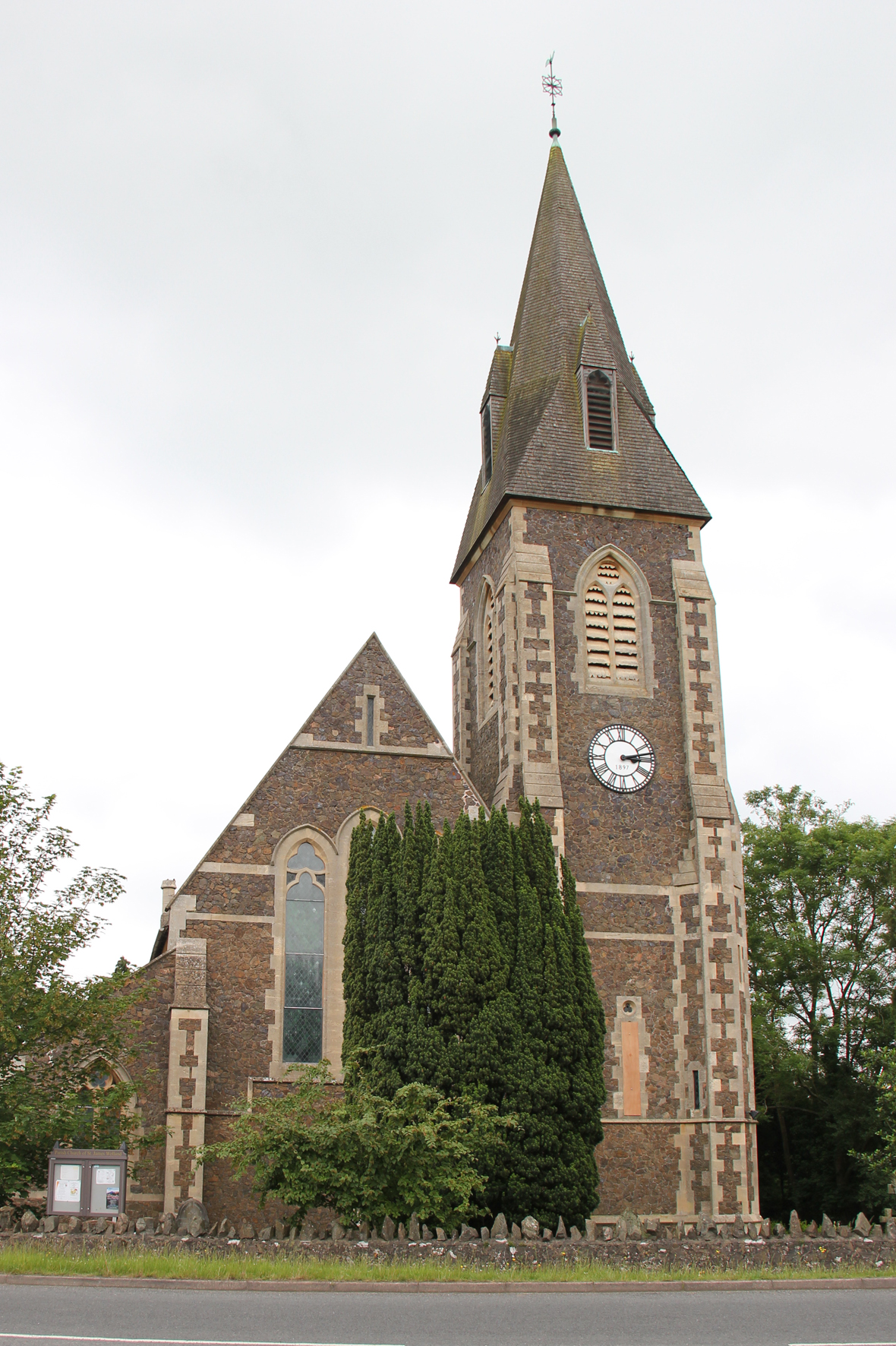 A photo of St James Church in Welland end on showing the clock tower