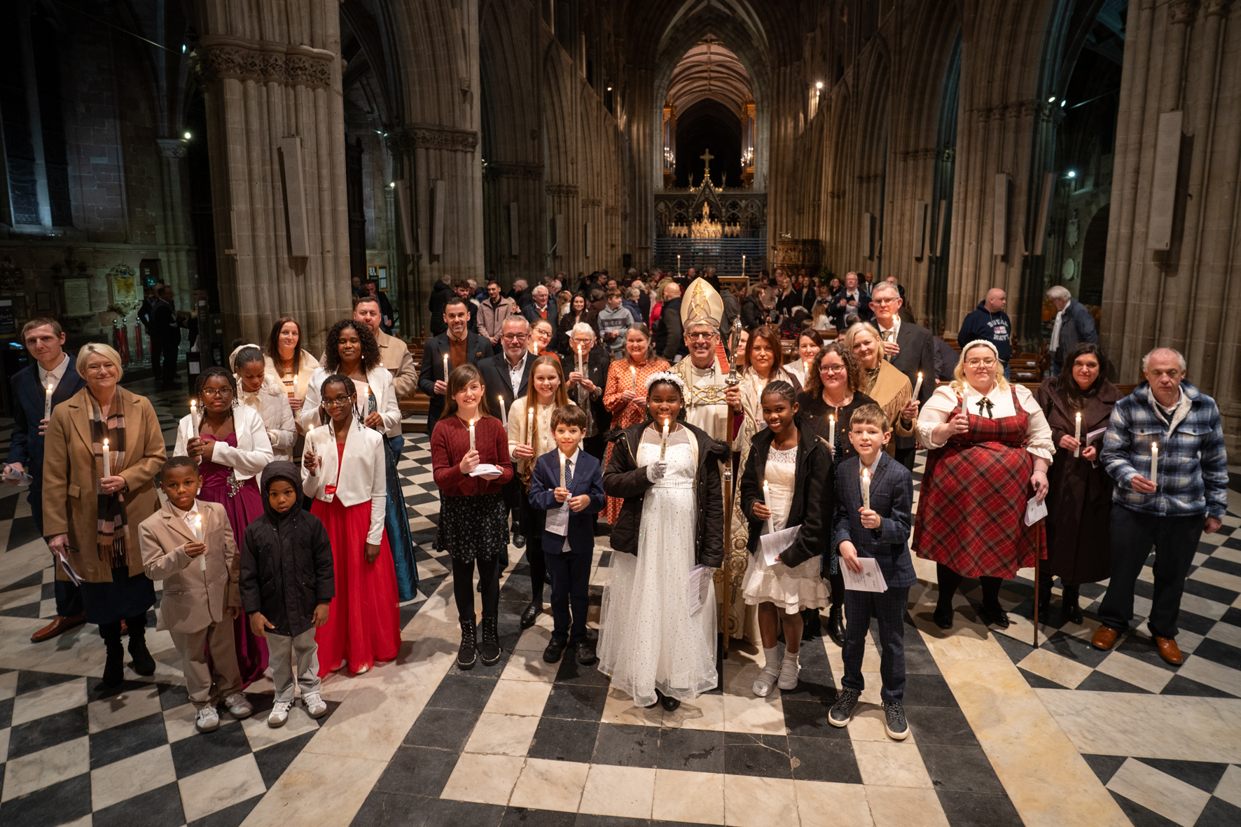 Confirmation Candidates standing with Bishop martin at the back of the Cathedral