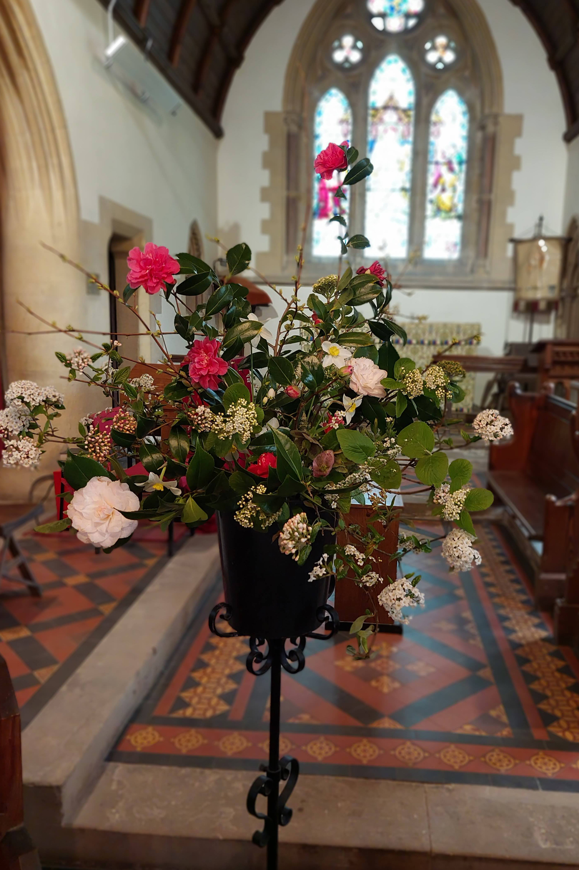 Flowers arranged sustainably in a church