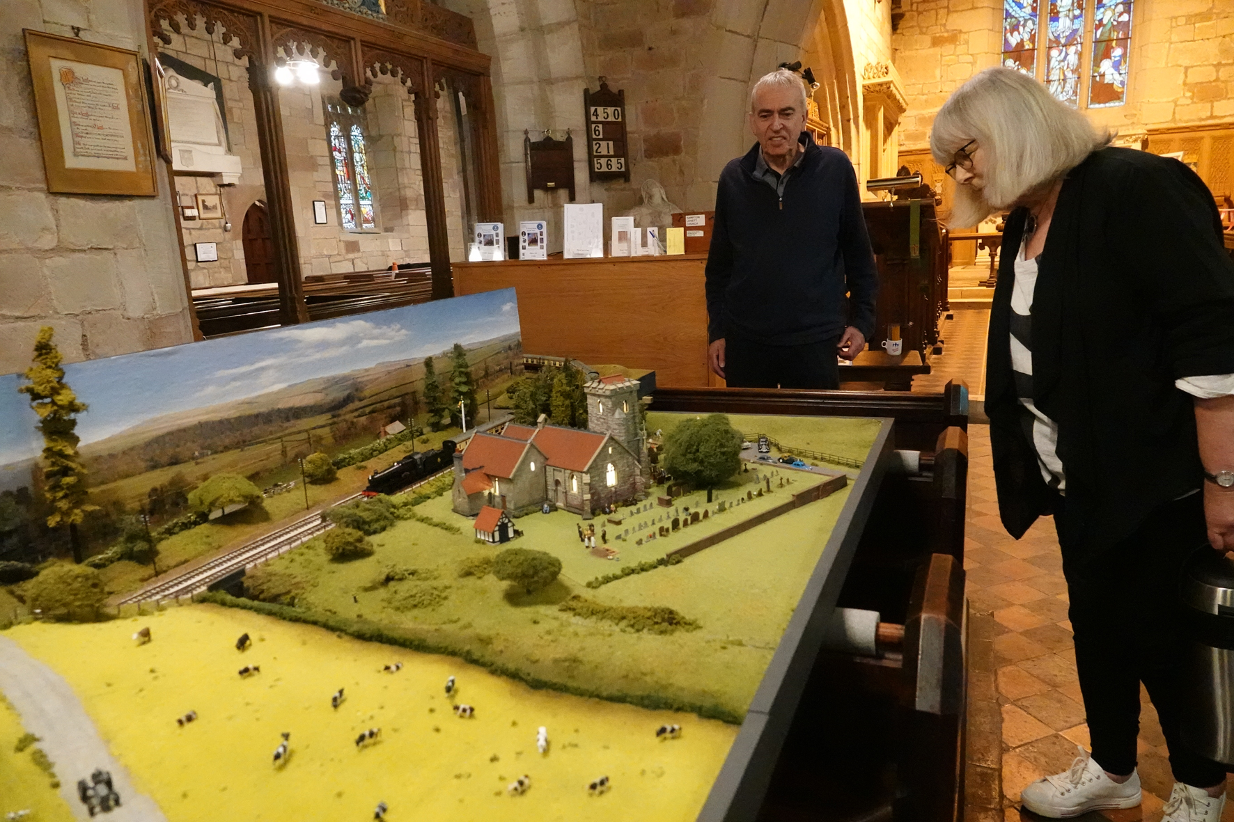 Looking at the model railway at Hampton Lovett church