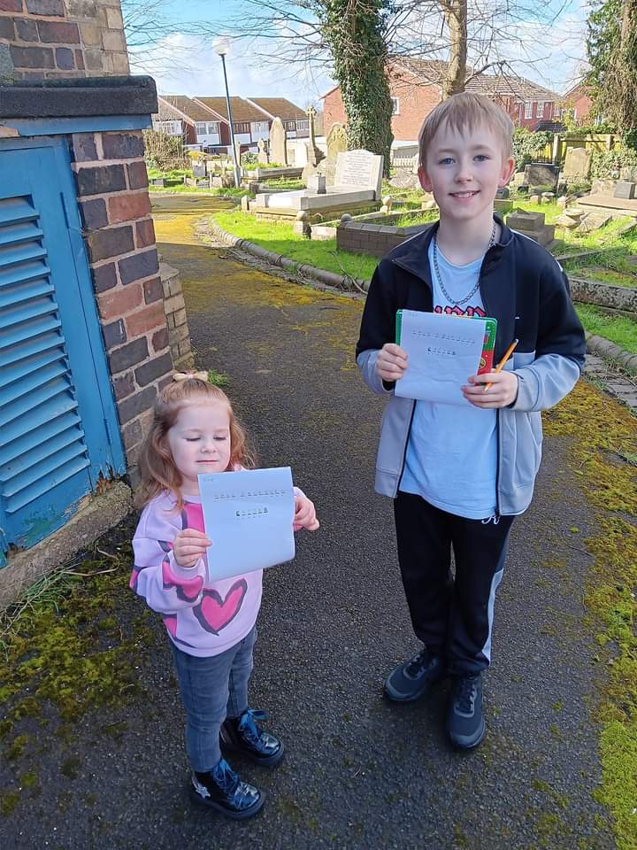 Two children completing the Easter egg hunt at Brockmoor Church
