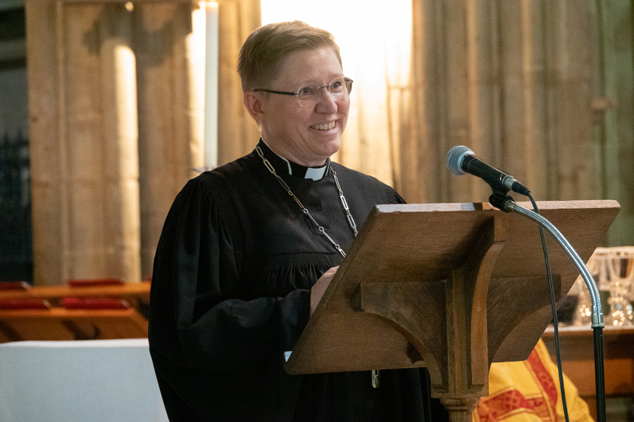 Bishop Bettina standing at the lectern in the Cathedral