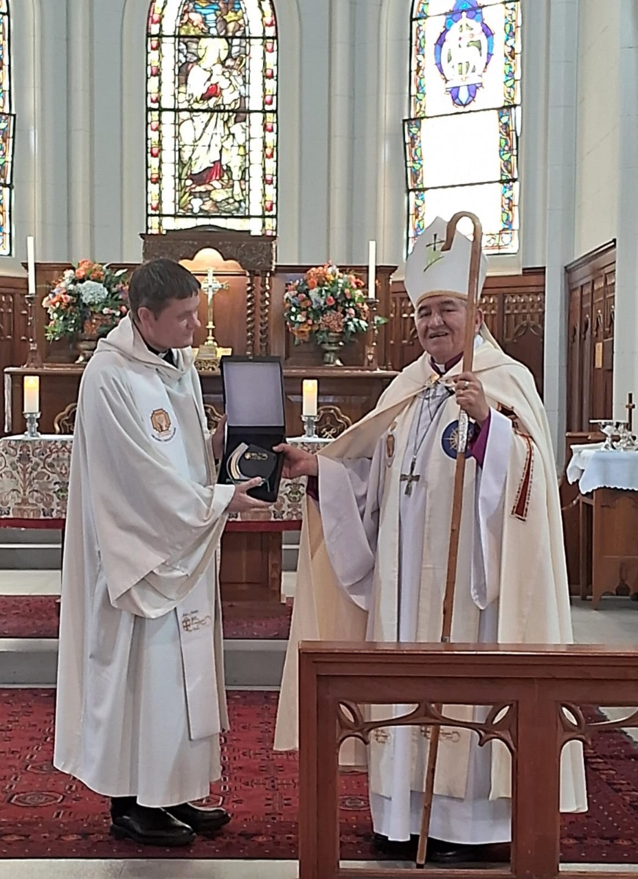 Phil Bradford given plaque to mark 32 years of Peru partnership by Bishop Jorge