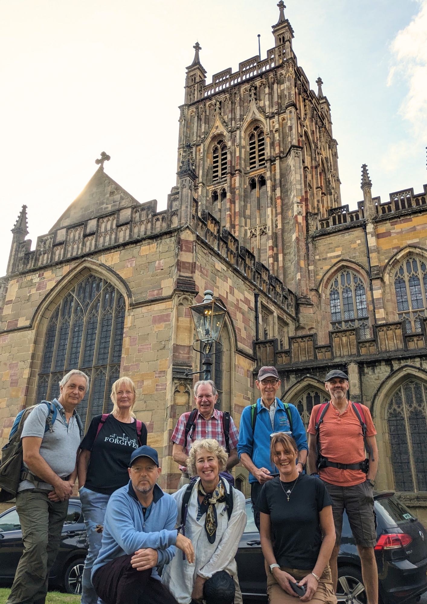 Pilgrims at the start of their journey outside Great Malvern Priory