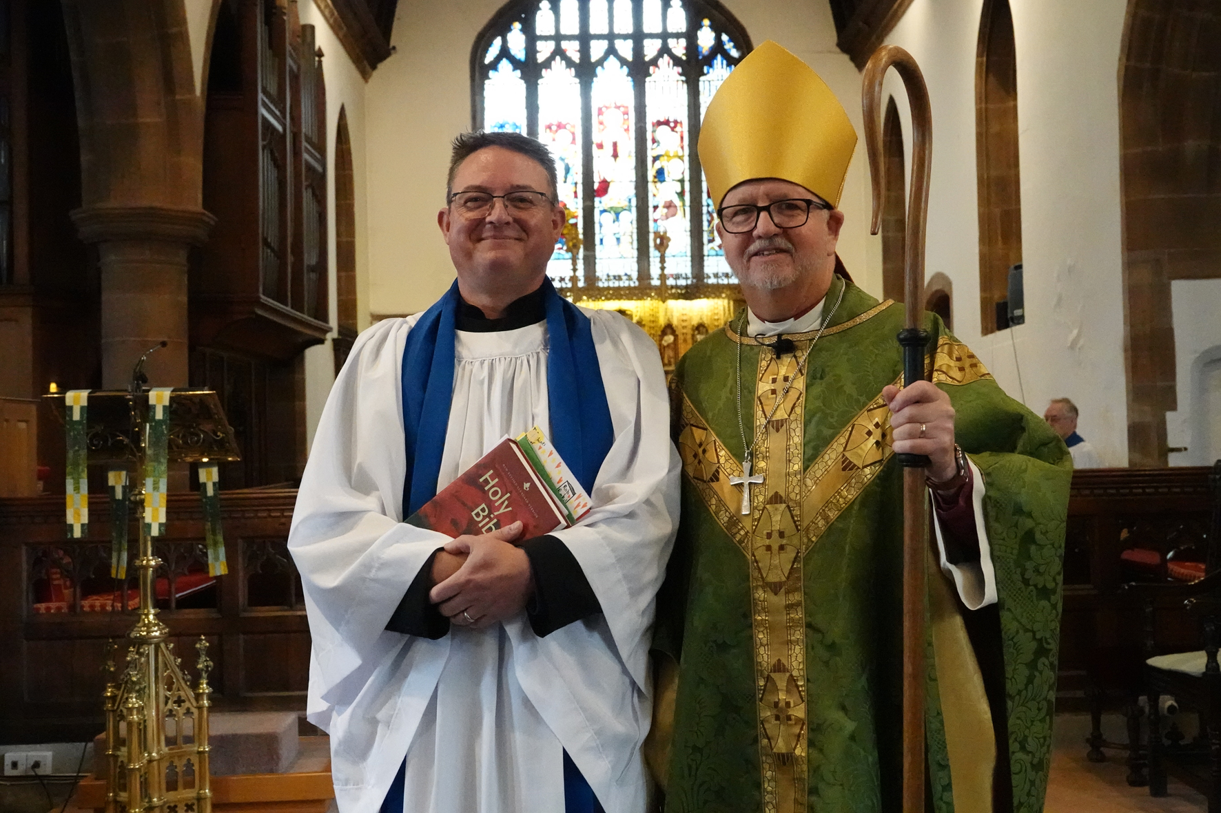 Rob Little standing next to Bishop Alan Winton after his licensing