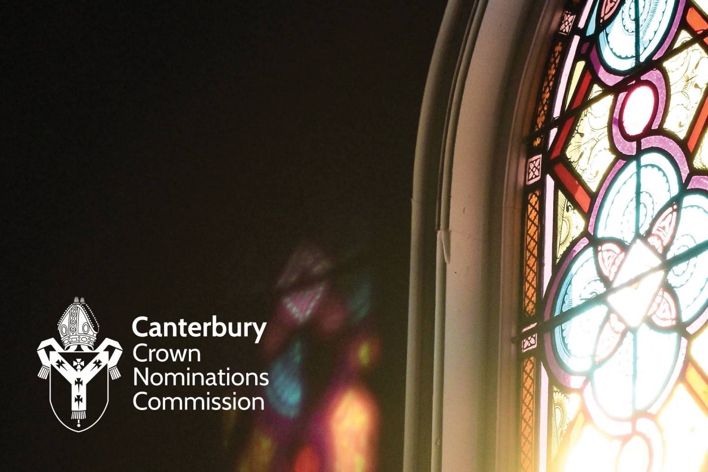 Canterbury logo next to a Stained Glass window