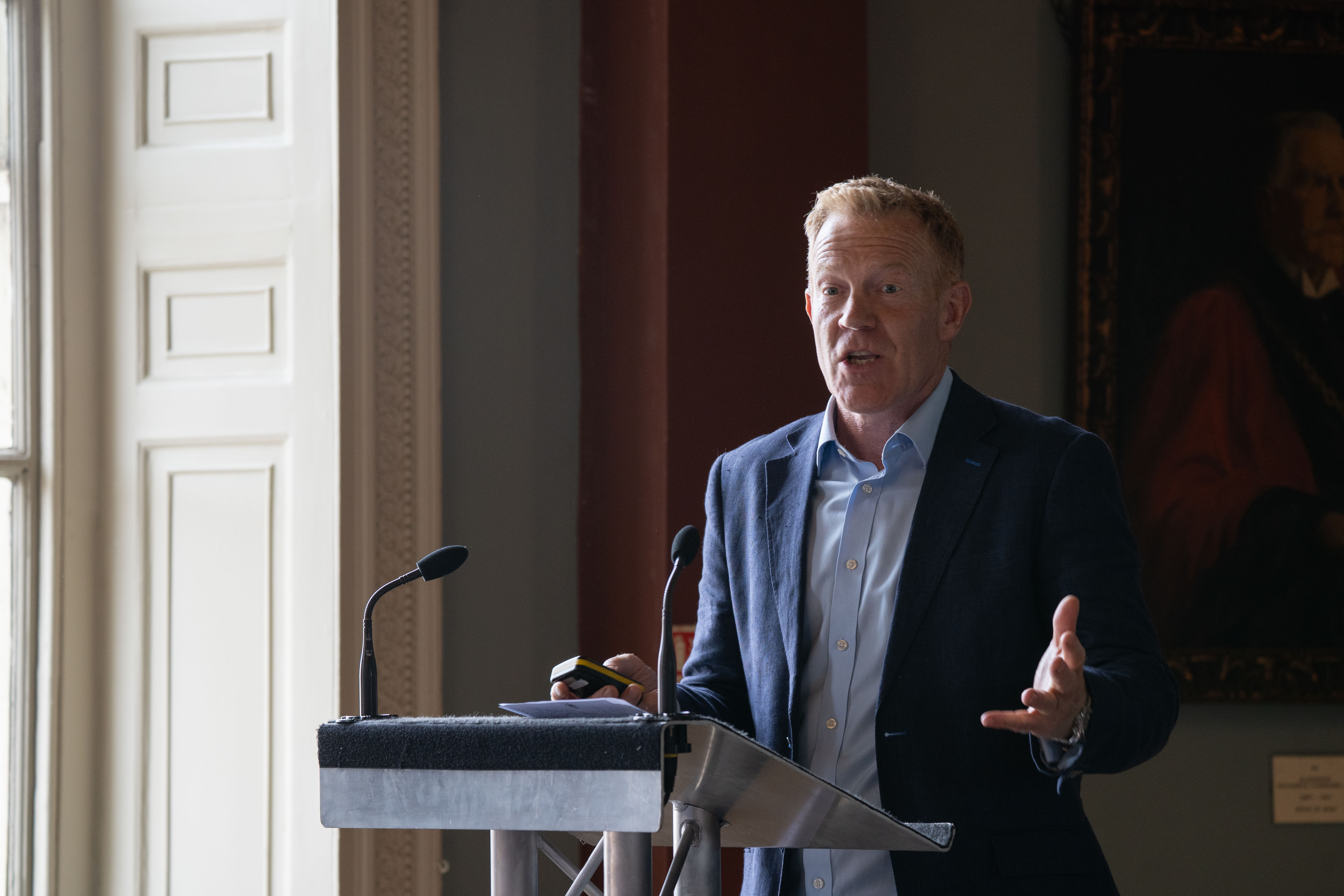 Adam Henson speaking at a lectern