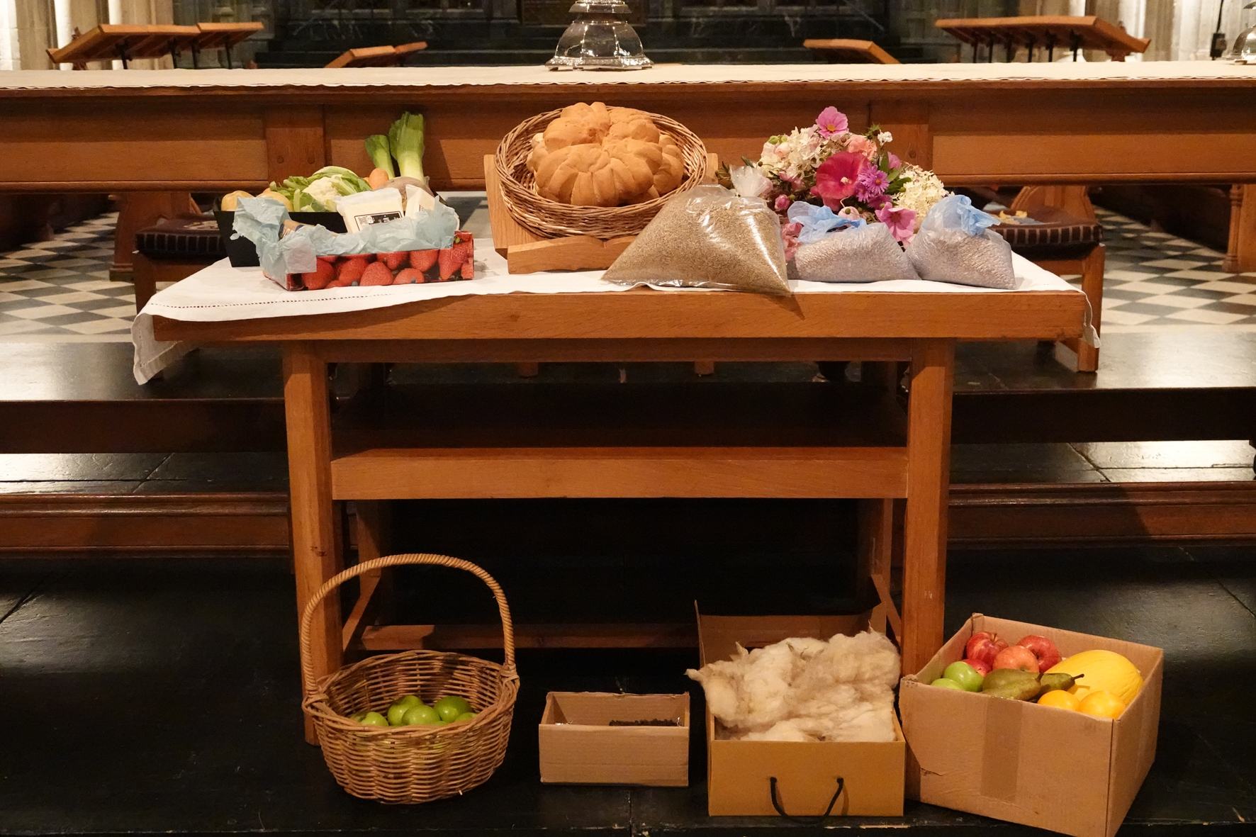 Harvest gifts on a table in front of the altar at the Cathedral