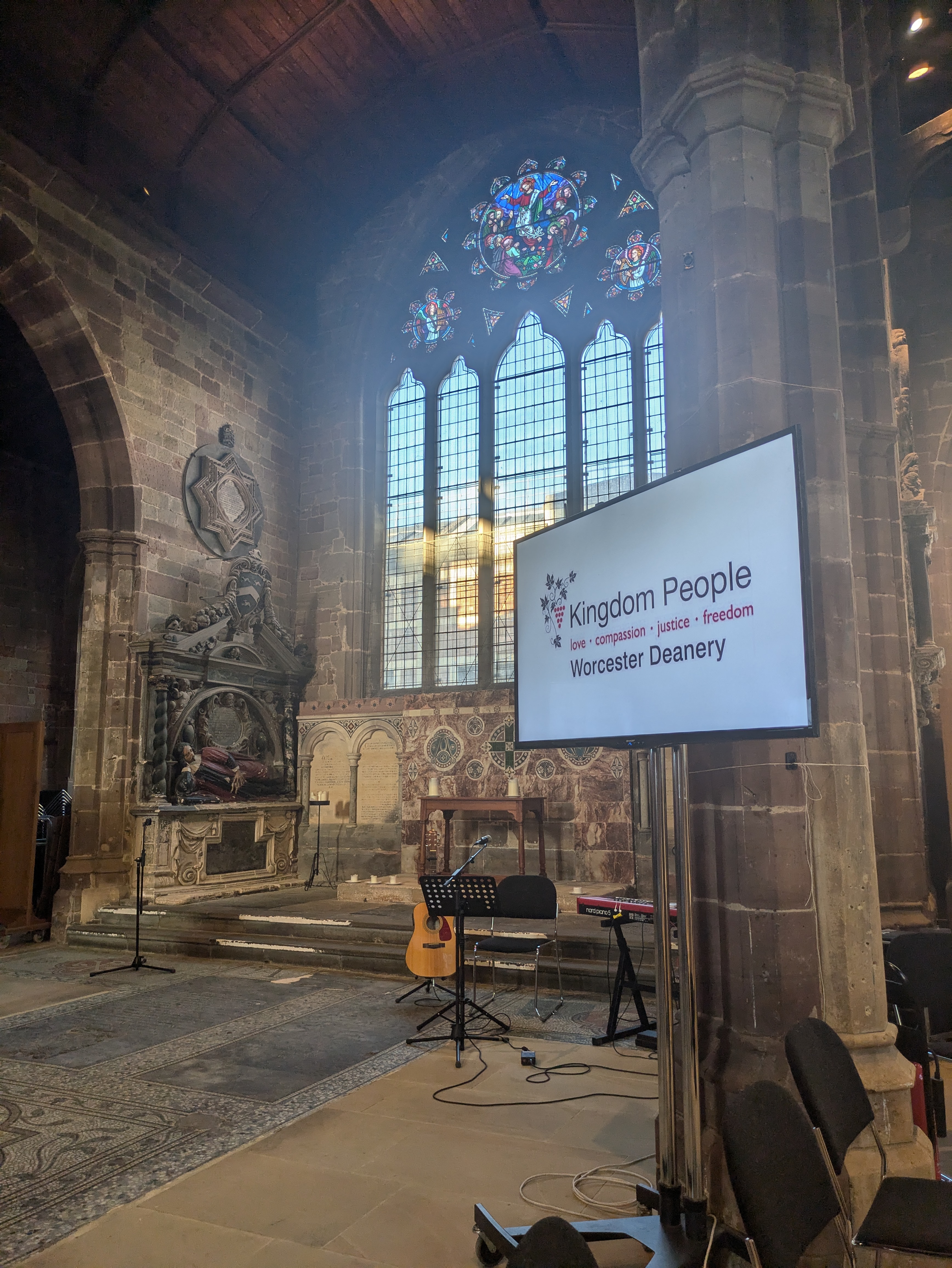 Screen at the front of St Helen's church Worcester deanery logo