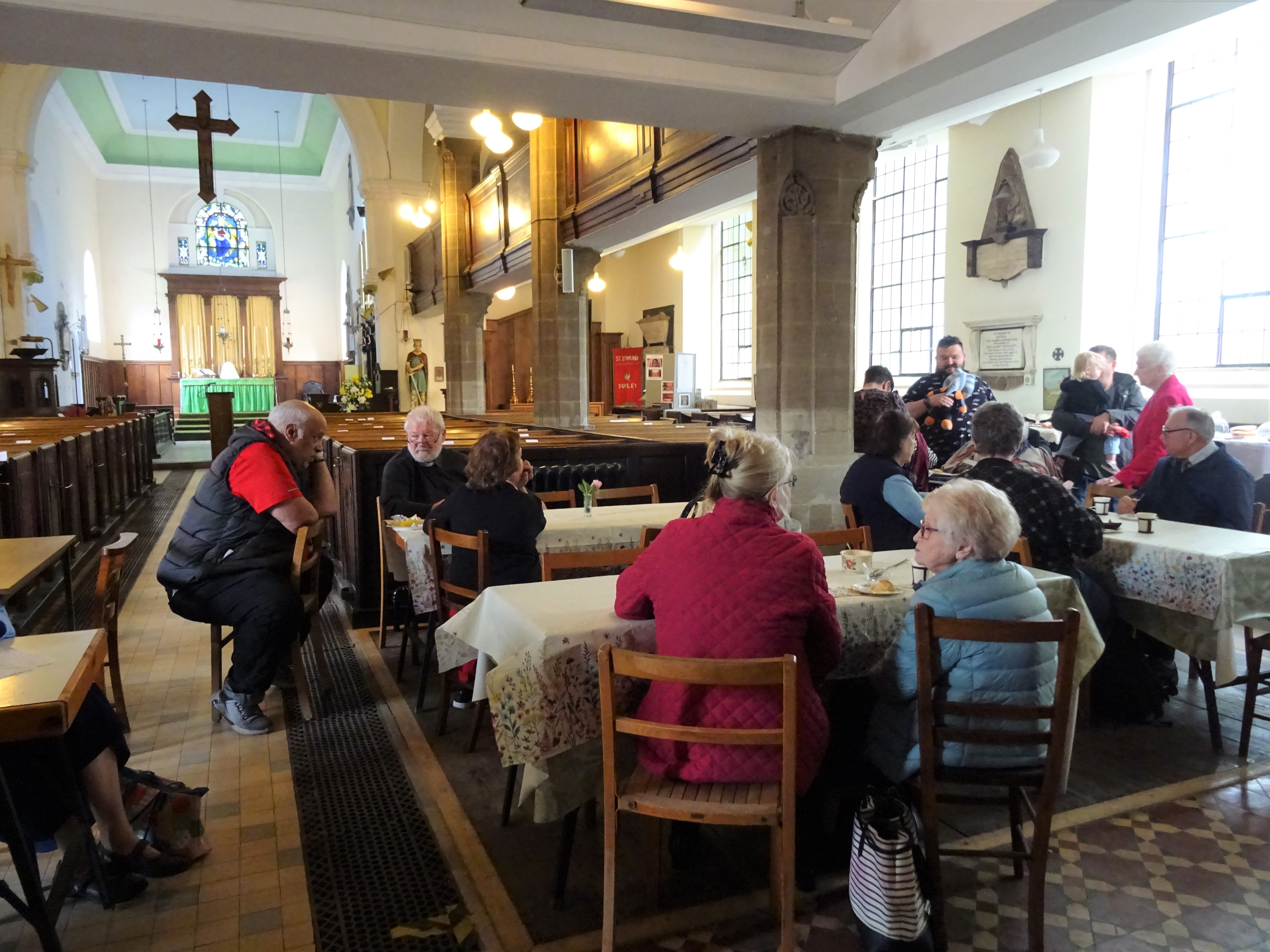 People enjoying refreshments in the new coffee area at St Edmund