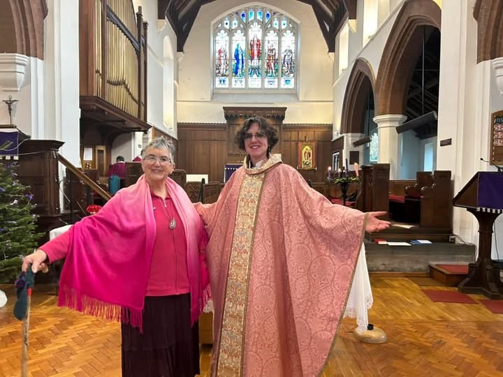 Reader Susan Cresswell in pink alongside Victoria Barlow in a role coloured robe for Gaudete Sunday