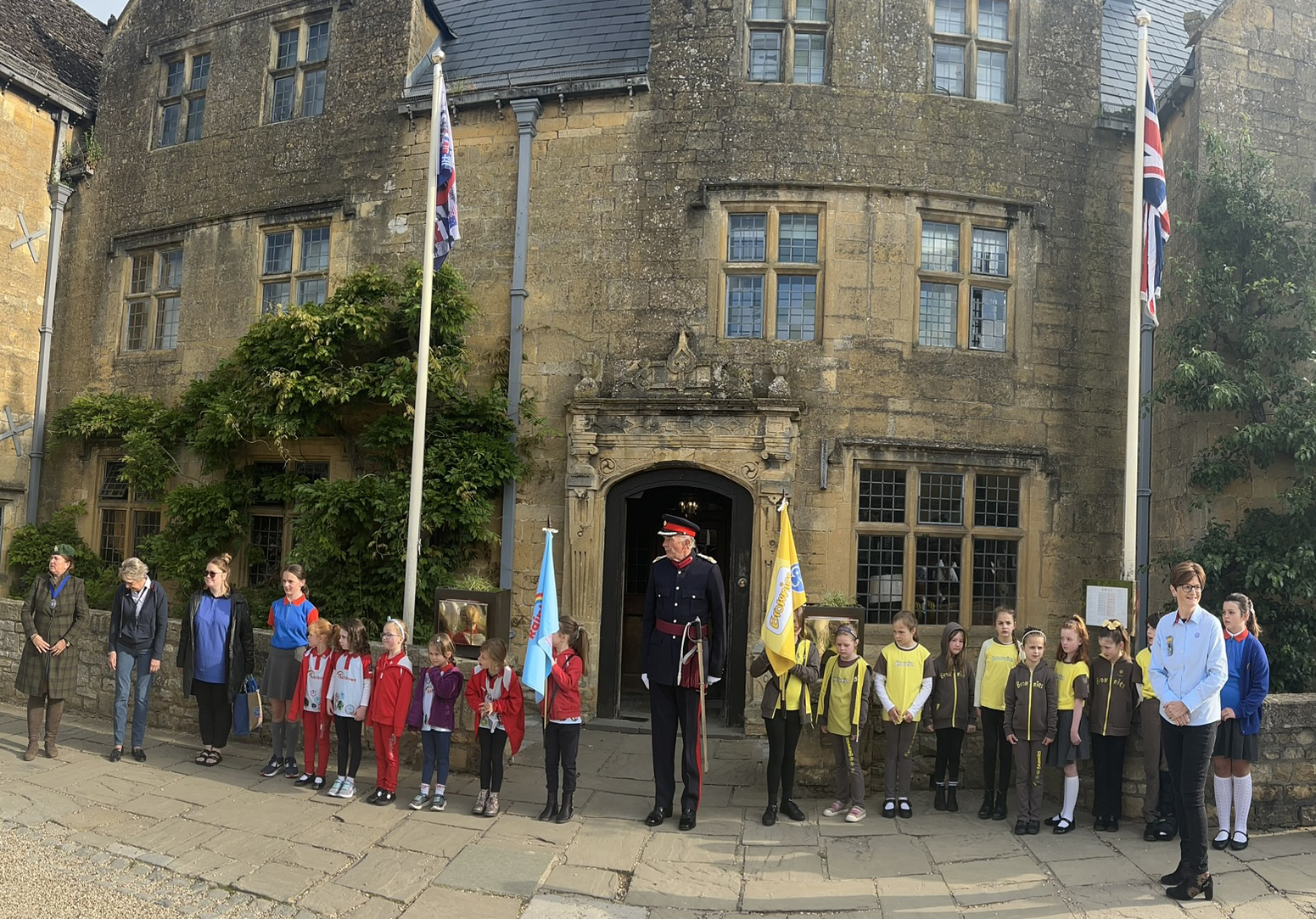 Rainbows, Brownies and Guides stood on parade outside the Lygon Arms in Broadway