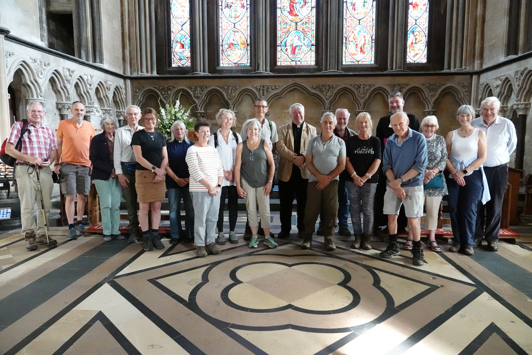 Members of Malvern and Upton Deanery standing in front of the altar in the Lady Chapel of the Cathedral with Dean Stephen Edwards