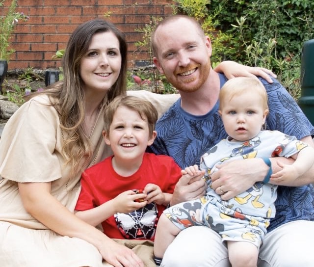 Sarah Powell with her husband and two sons