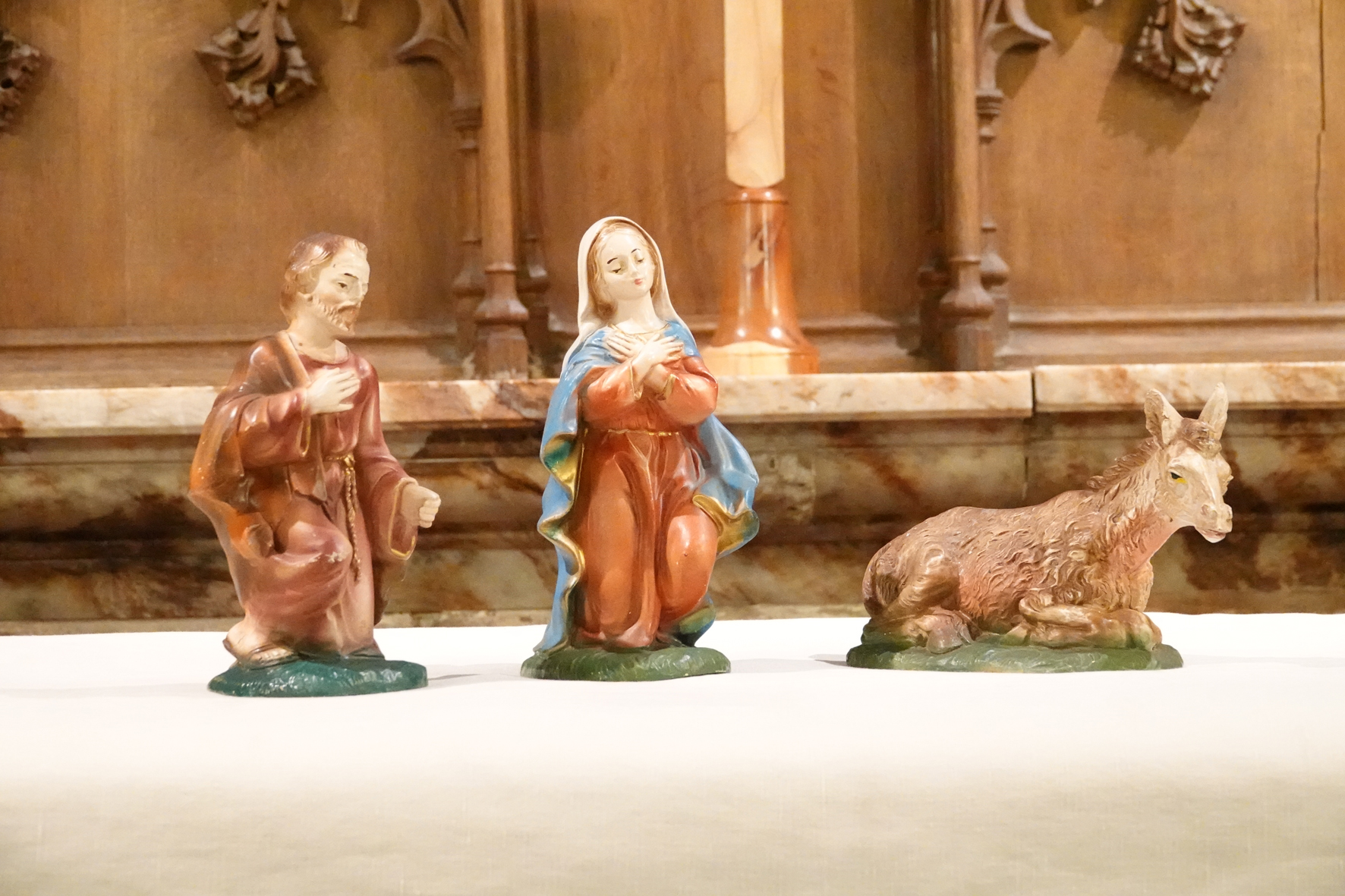 Models of Mary Joseph and a donkey on the altar at Claines church