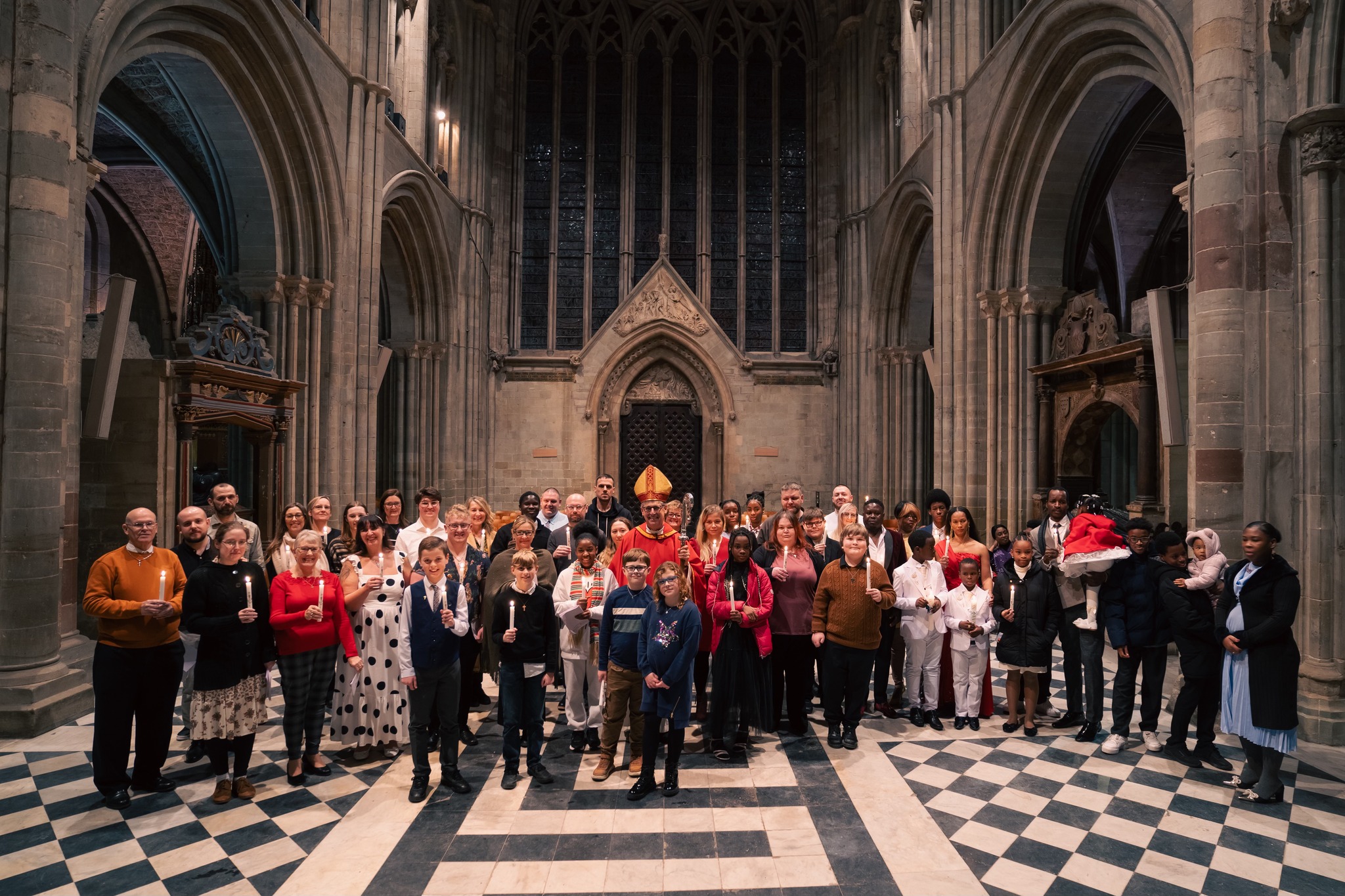 Confirmation candidates with Bishop Martin inside the West end of the Cathedral