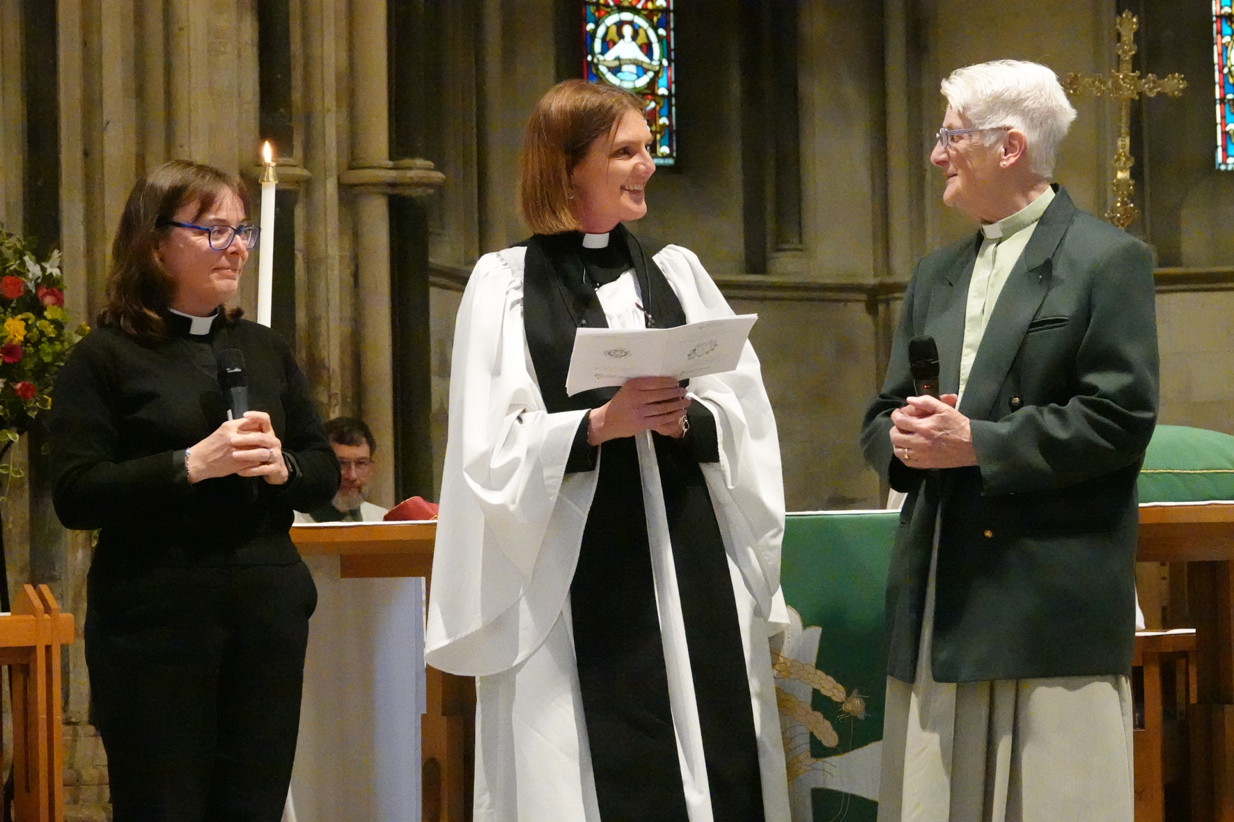 Becky Elliot standing between Jayne Parker & Andi Jones as they discuss the ministry of women at Pershore Abbey