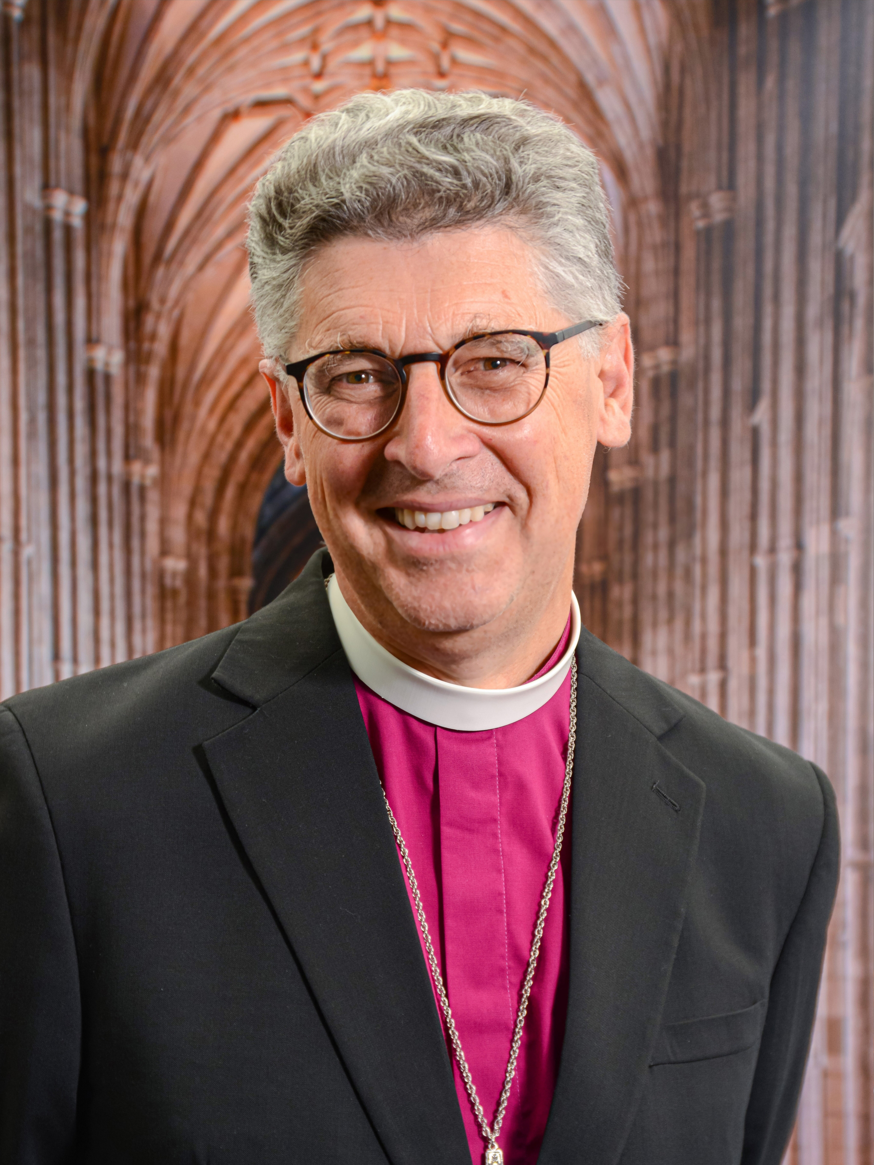 Head and shoulder shot of Bishop Martin inside a cathedral