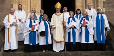 Readers with Bishop John outside the cathedral 2023.jpg