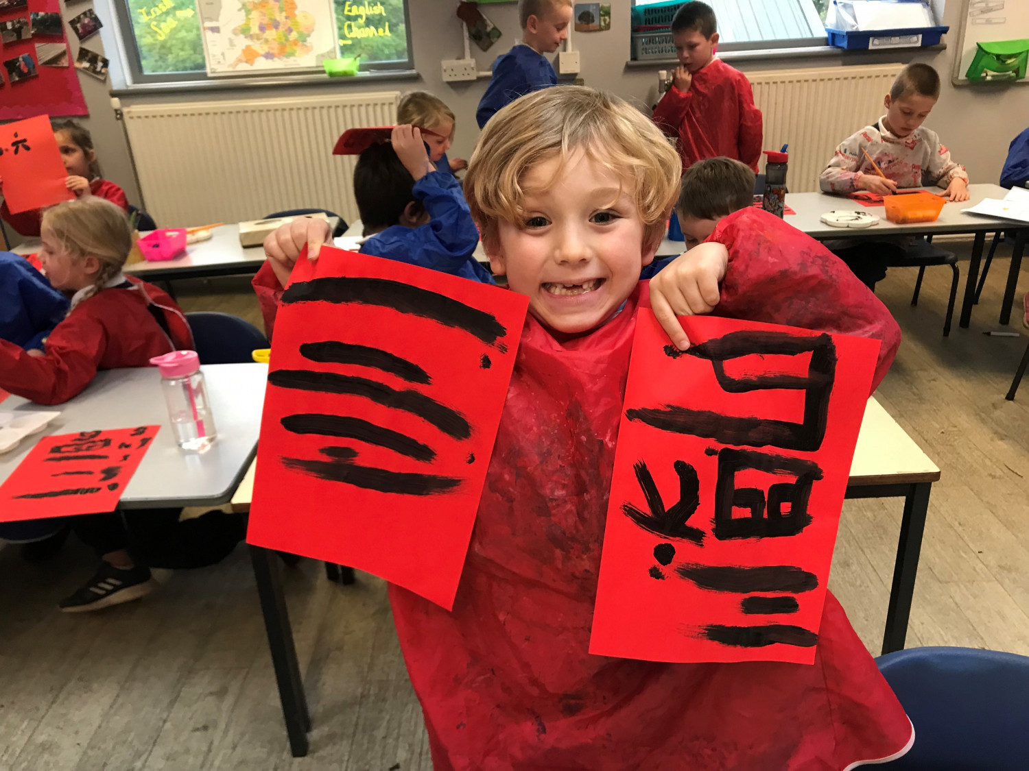 Pupil with Chinese writing