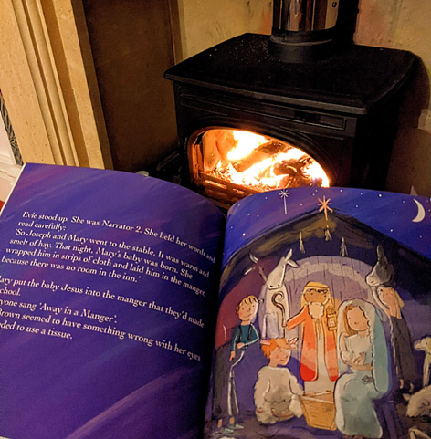 Reading the book by the fire
