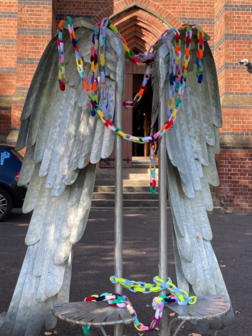 Chains on the Angels wings at Cradley Church