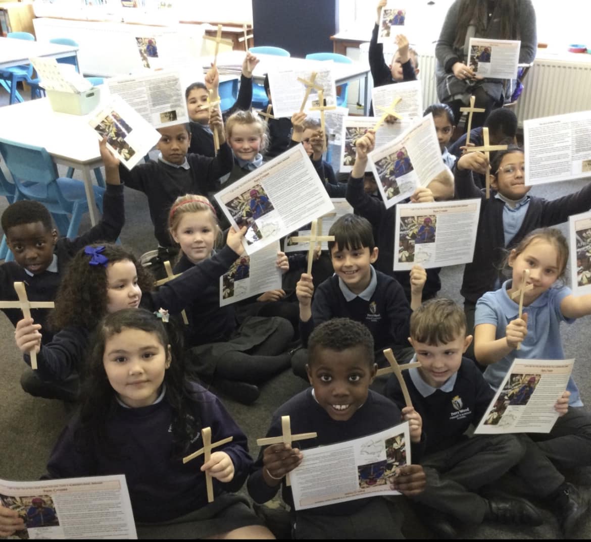 Children in year 2 with their palm crosses