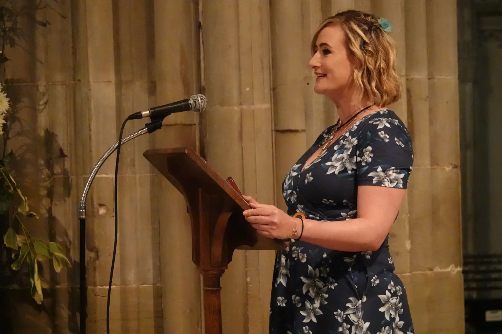 Angie Richardson standing at the lectern in the Cathedral