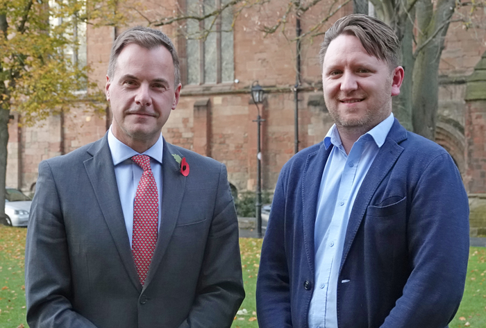 Gareth Doodes standing with Mark Carter