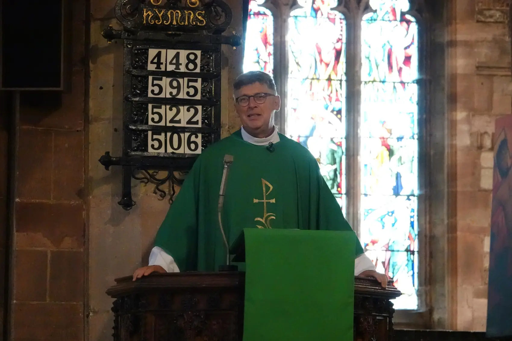 Bishop Martin standing in the pulpit at St John's Church in Halesowen