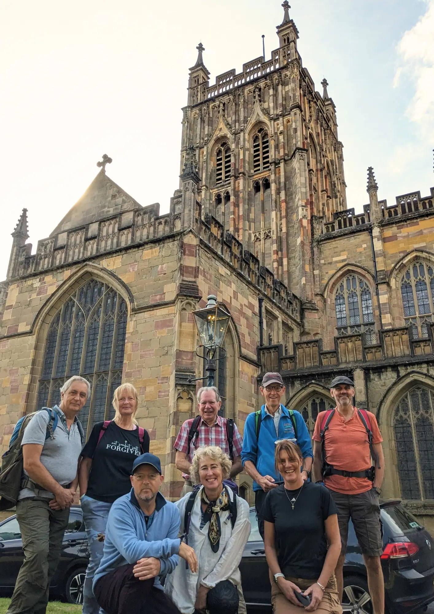 Pilgrims at the start of their journey outside Great Malvern Priory