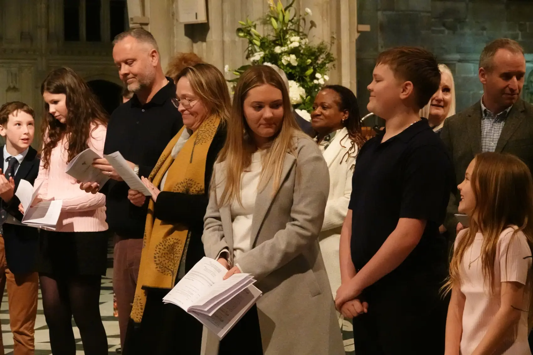 Members of the Penny family standing with other confirmation candidates in the Cathedral