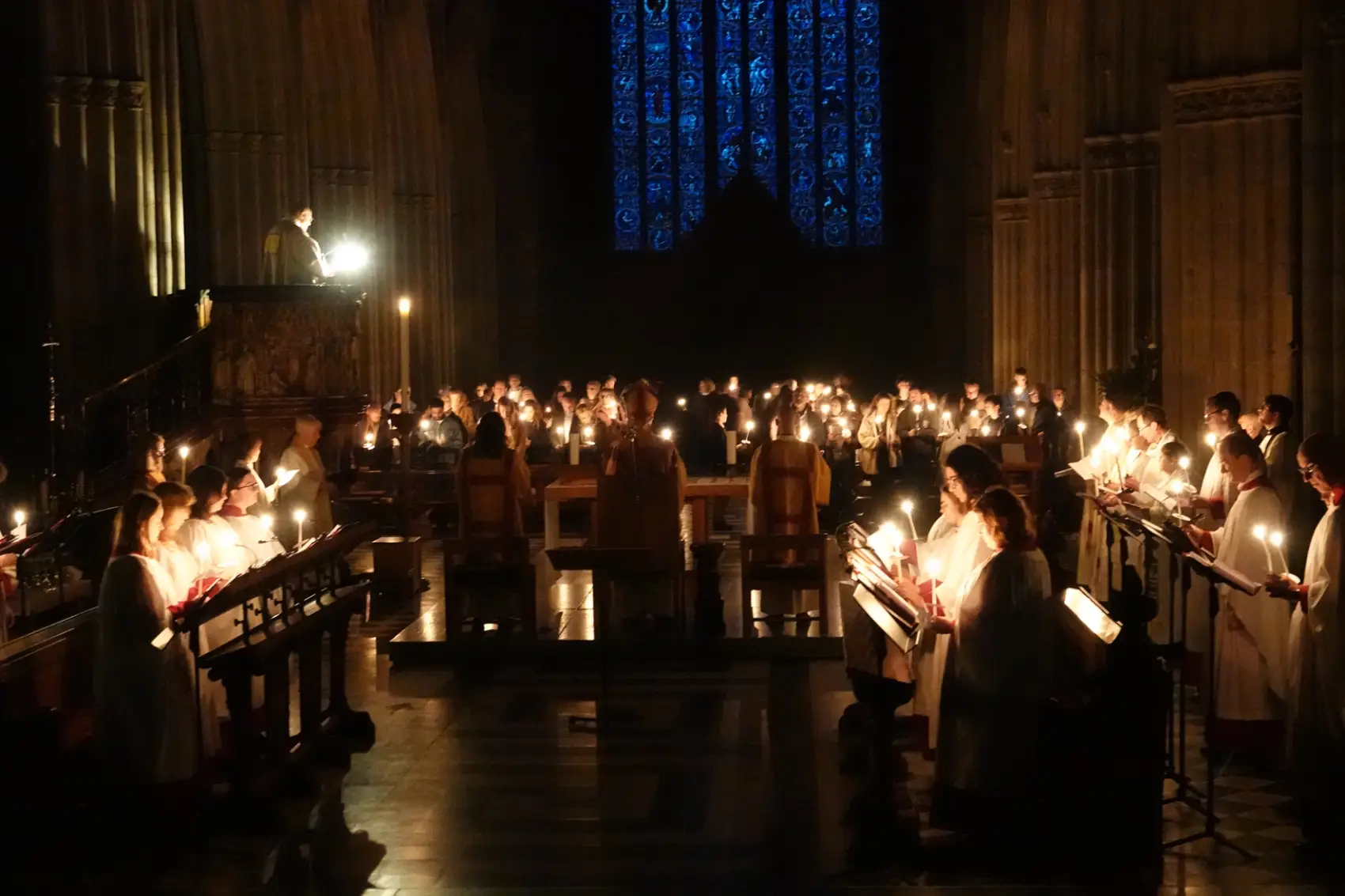 The cathedral lit only by candles at the Easter Eve service