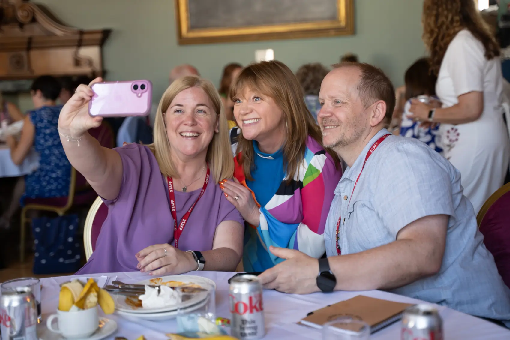 Two teachers taking a selfie with Kate Bottley