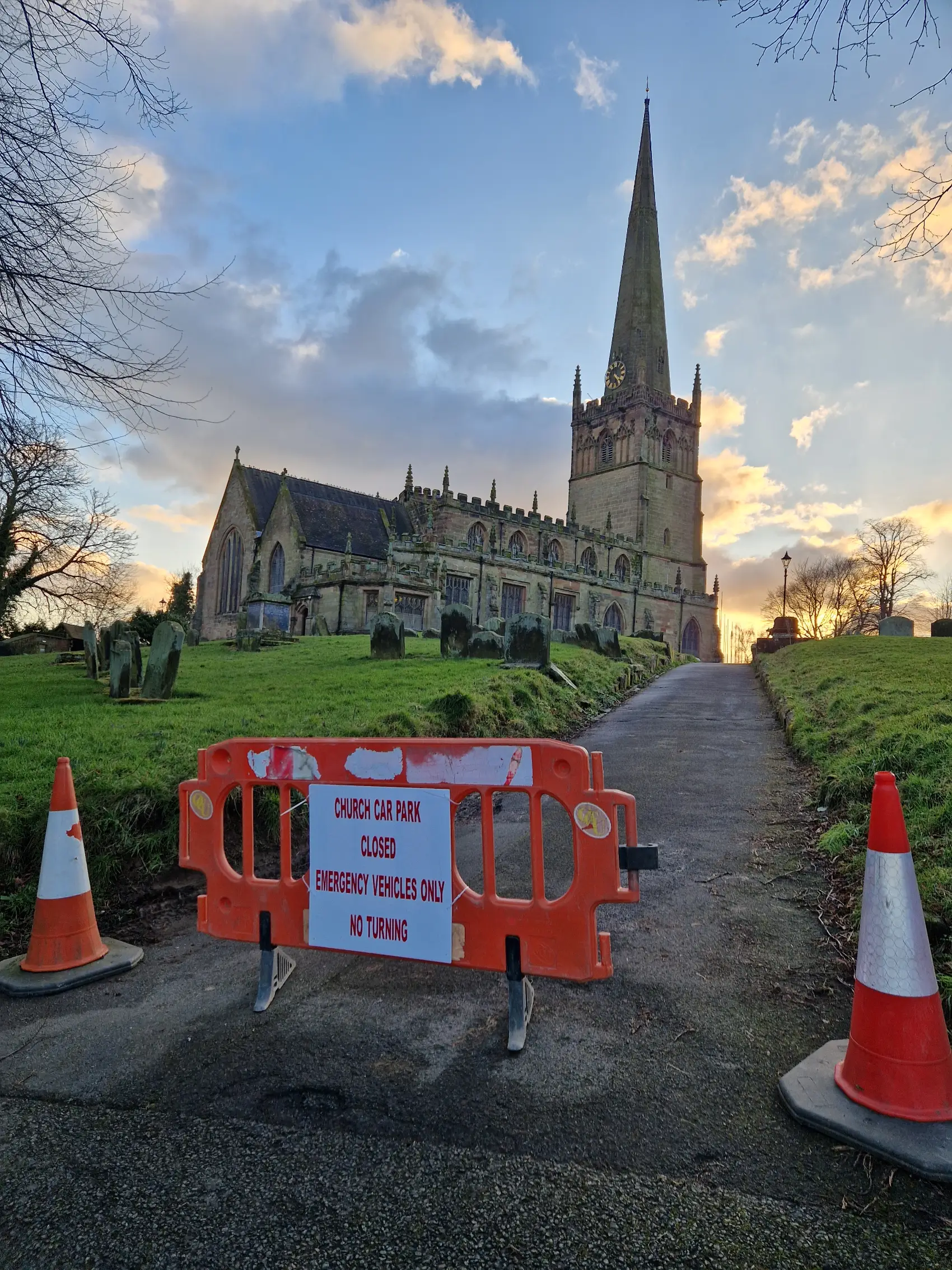 Picture of a fence across the drive to St John's church in Bromsgrove with a no entry sign
