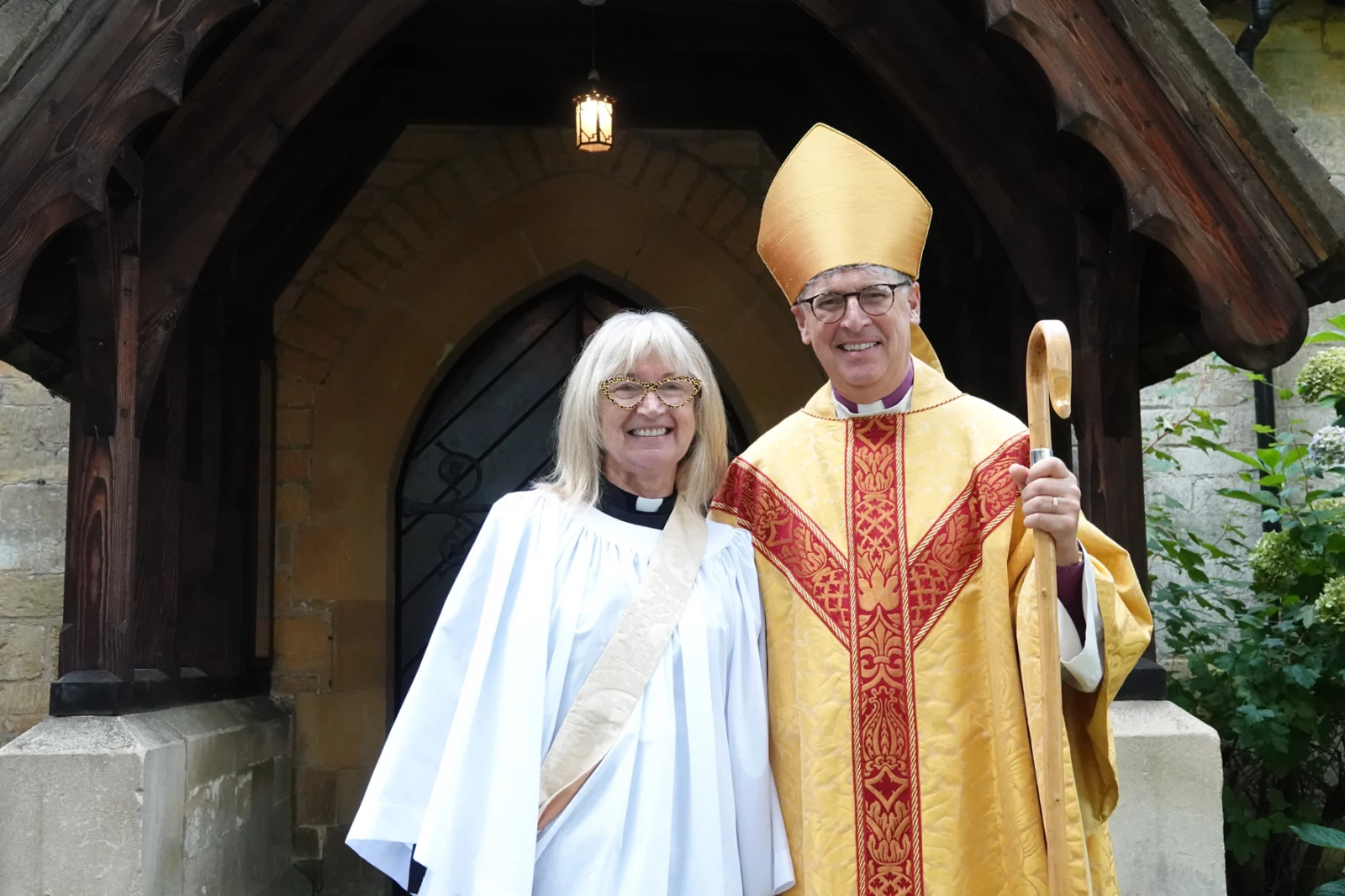 Penny Gordon standing with Bishop Martin after her ordination